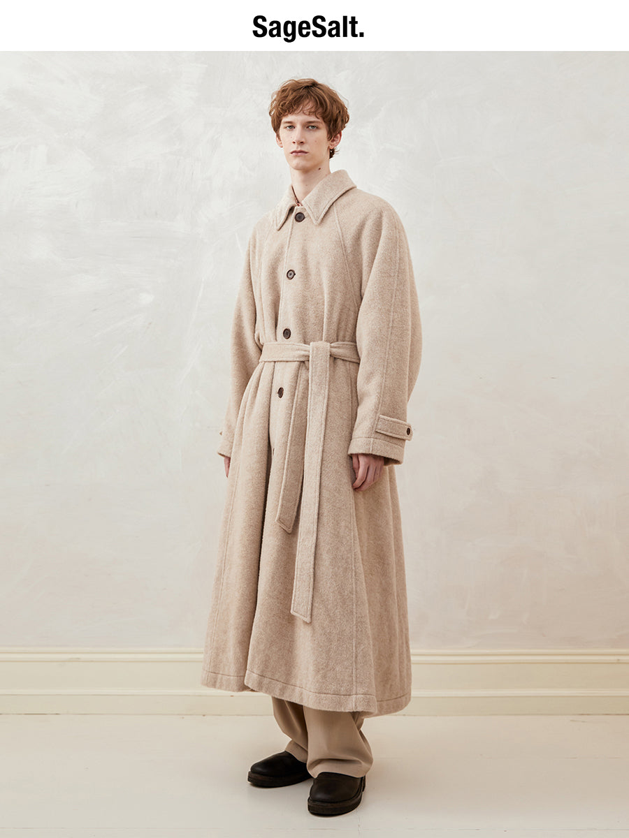 Loose-fitting, drop-shoulder, A-line, long coat with a wide hem