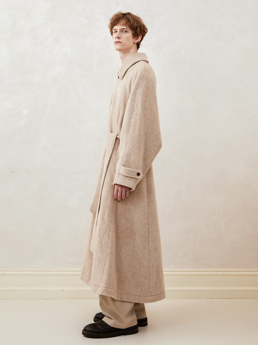 Loose-fitting, drop-shoulder, A-line, long coat with a wide hem
