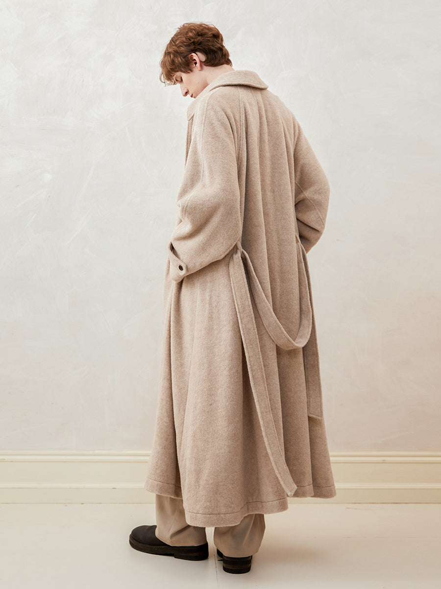 Loose-fitting, drop-shoulder, A-line, long coat with a wide hem