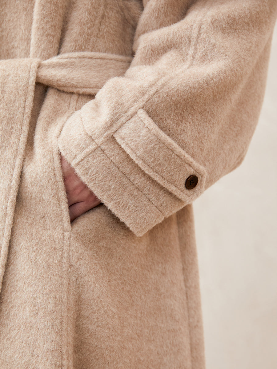 Loose-fitting, drop-shoulder, A-line, long coat with a wide hem